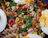 A picture of step 2 of Veg Pasta with Egg and flavoured bacon bits carrot chips + Dip.