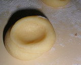 Foto del paso 7 de la receta: Galletitas pepas de dulce de leche