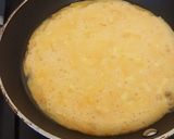 A picture of step 3 of Two cheese and cherry tomato omelette :).