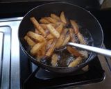 A picture of step 2 of Honey Chilli Potatoes.