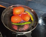 A picture of step 3 of Baingan bharta with spring onion.