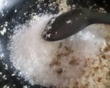 A picture of step 2 of Surul /churul appam (coconut crepe roll).