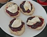 A picture of step 3 of My Afternoon Tea open Scones with Cherry Jam and Clotted Cream.