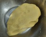 A picture of step 5 of Palm dumplings stuffed with sweetened coconut.