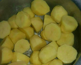 A picture of step 5 of Potato beans.