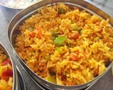 A picture of step 10 of Veg Masala bhath and Cucumber Carrot Raita.