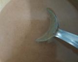 A picture of step 3 of Chocolate biscuit cake.