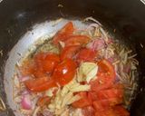 A picture of step 1 of Chicken masala with peas pulao rice.