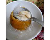 A picture of step 4 of Orange Kulfi in orange shell.