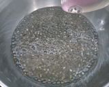 A picture of step 1 of Rooh afza drink with chia seeds.