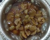 A picture of step 5 of Gooseberry palm Candy.