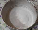 A picture of step 3 of Holi special Vanilla colourful cake.
