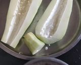 A picture of step 1 of Papaya pickle.