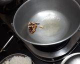 A picture of step 1 of Gud ka Meetha Chawal.