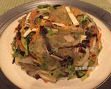 A picture of step 14 of Stir-Fried Mixed Vegetables with Egg Crepe and Curry Sauce.