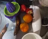 Foto del paso 1 de la receta: Batido de banana, durazno y naranjas😋