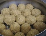 A picture of step 4 of Besan coconut ladoo.