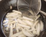 A picture of step 3 of Peri peri French fries.