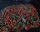 Une image de l'étape 11 de Poivrons et tomates à l'ail et anis vert.