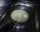 A picture of step 4 of Masoor ki daal with rice.