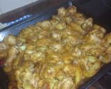 Foto del paso 5 de la receta: Muslitos de pollo glaseados con papas panaderas
