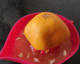 A picture of step 1 of Melon orange summer sip.