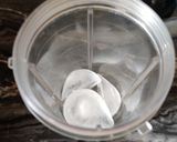 A picture of step 1 of Mango Milk Shake with Vanilla Ice Cream.