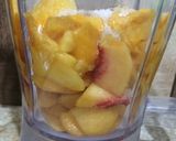 A picture of step 1 of Mango 🥭 peach 🍑 smoothie.