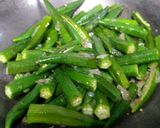 A picture of step 2 of Spicy schezwan bhindi.
