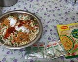 A picture of step 3 of Maggi Nutrilicious Masala VEG ATTA noodles Vegetables pizza.