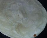 A picture of step 3 of Puri paratha in tawa style.