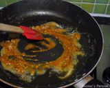 A picture of step 4 of Eggplatns onions with tomato sauce.