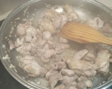 Foto del paso 2 de la receta: Arroz meloso de pollo al ajillo