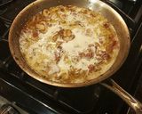 A picture of step 17 of Roast Chicken Thighs in a Sautéed Mushroom Parmasan Garlic Cream.