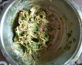 A picture of step 2 of Punjabi kadhi with baked pakoras.