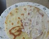 A picture of step 10 of Cheese chicken and veggies tortilla wrap.