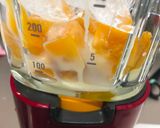 A picture of step 1 of Milk Mango Smoothie.