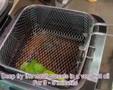 A picture of step 6 of Chicken wrapped in fragrant pandanus leaves. (Pandan Chicken).
