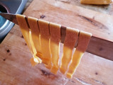 Parpadelle fresche con salsiccia, melanzana e finocchietto