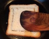 A picture of step 6 of Cheese Tomato Egg Toast.