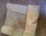 A picture of step 6 of Tikka roll.