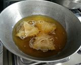A picture of step 26 of Atta Sooji Samosa.