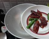 A picture of step 2 of Sev Tamatar ki Sabzi.