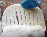 Foto del paso 4 de la receta: Pan "ovillo de lana" relleno con membrillo, pasas de uva y maní💜