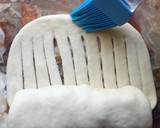 Foto del paso 4 de la receta: Pan "ovillo de lana" relleno con membrillo, pasas de uva y maní💜