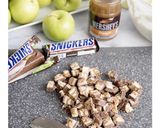 A picture of step 2 of Caramel Apple Snickers Salad.