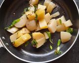A picture of step 4 of Brahmi potato curry.