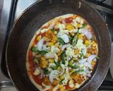 A picture of step 2 of Paneer tikka pizza.
