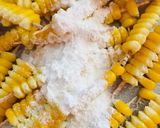 A picture of step 3 of Masala corn fries.