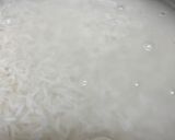 A picture of step 1 of Coconut rice 🍚.